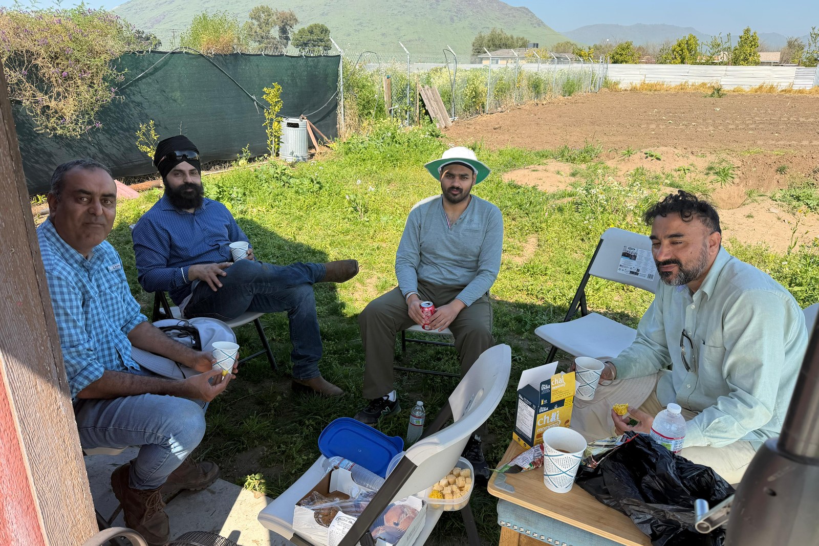 Outdoor research discussion with collaborators during a USA field visit